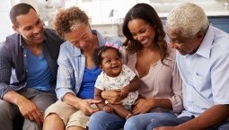 Parents and grandparents with child